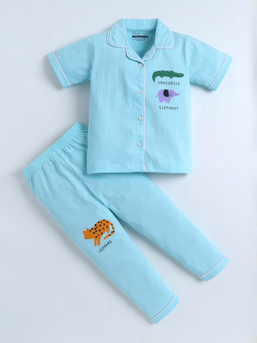 Children's pajama set with crocodile and elephant designs on a light blue background