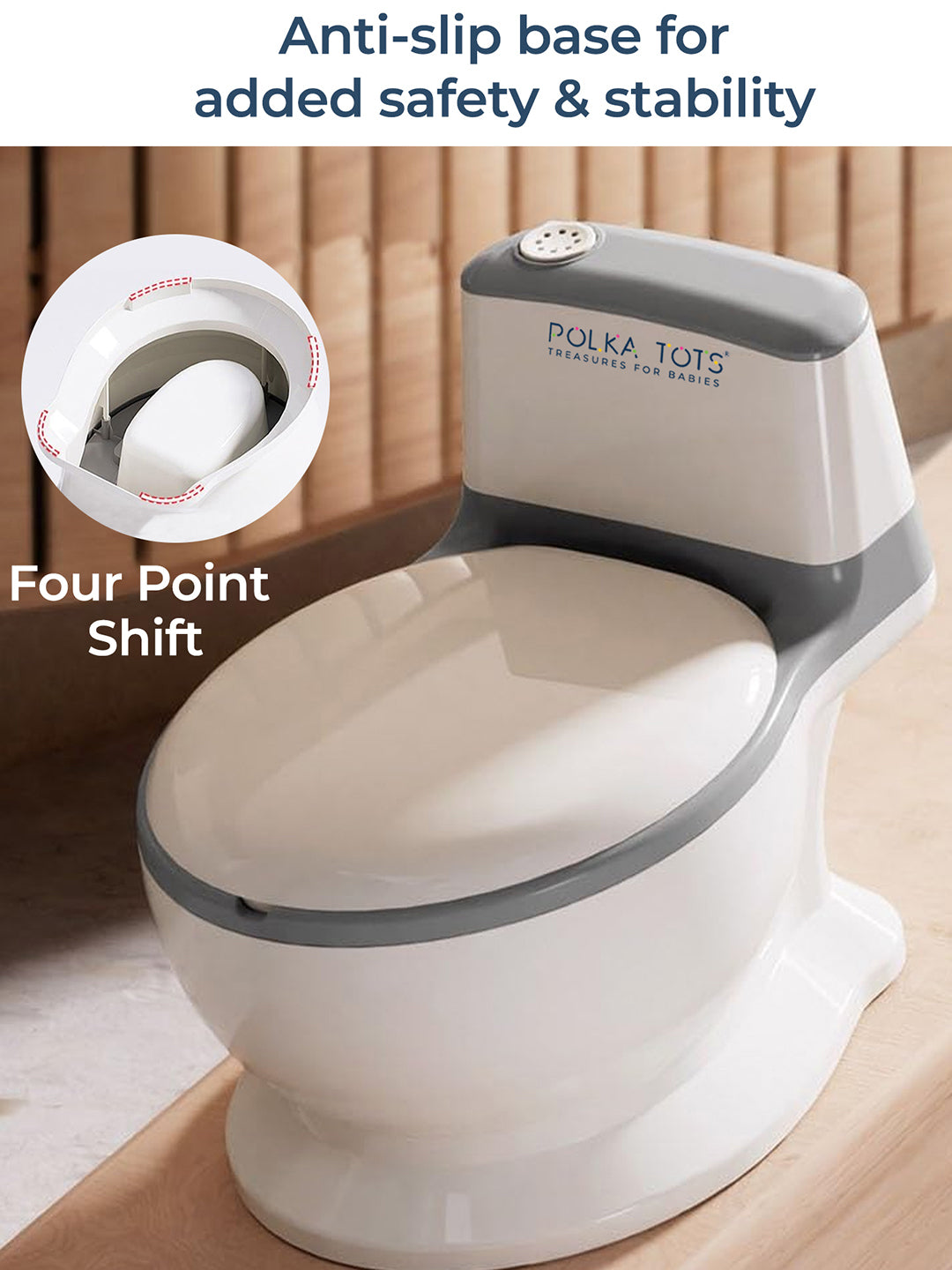 White and gray children's potty seat with anti-slip base and four-point shift feature on a wooden floor.
