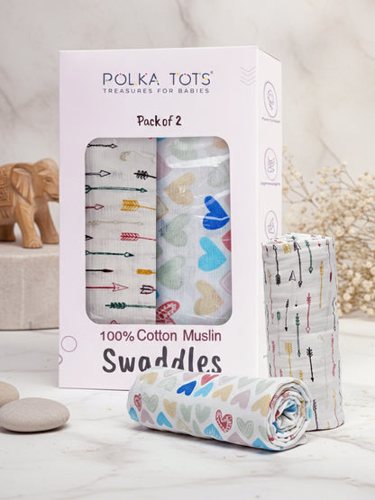 Polka Tots 100% Cotton Muslin Swaddles packaging with swaddles on a light background