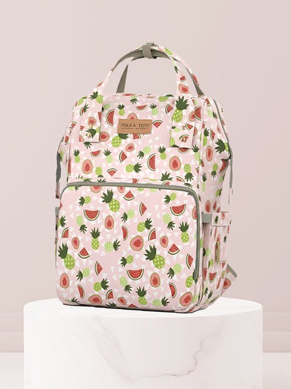 Backpack with watermelon and pineapple pattern on a light gray background