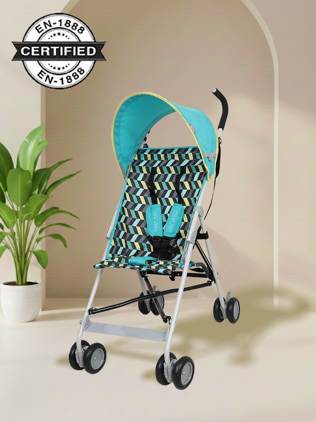 Baby stroller with teal canopy and patterned seat on a beige background