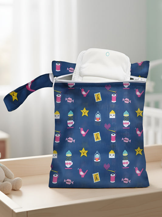 Blue patterned diaper bag with a white interior on a light wooden surface.