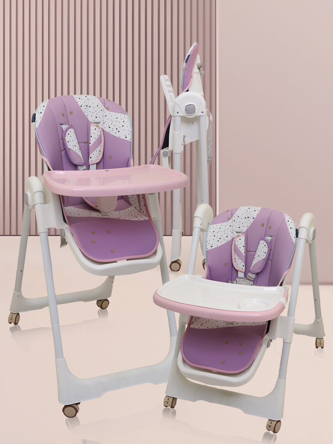 Purple and pink baby high chair with white frame on a light pink background