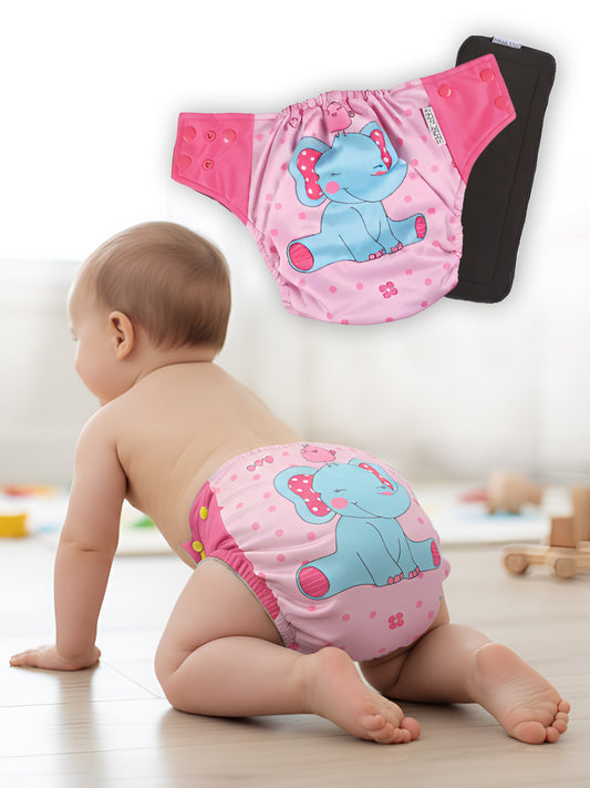 Baby wearing pink elephant-patterned diaper with additional diapers displayed.