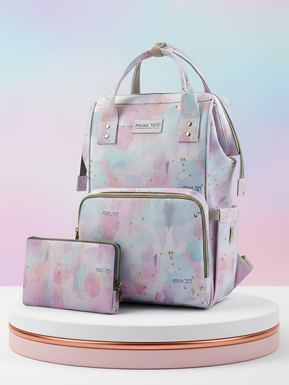Floral-patterned backpack and wallet set on a gradient background