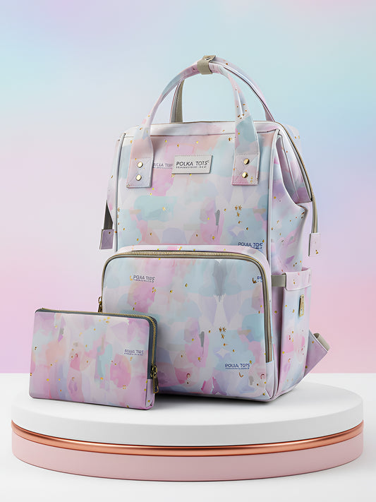 Floral-patterned backpack and wallet set on a gradient background