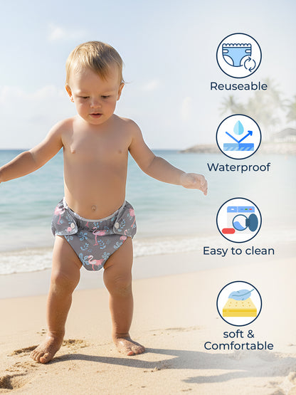 Child wearing a reusable diaper on a beach with icons indicating reuse, water resistance, ease of cleaning, and comfort.