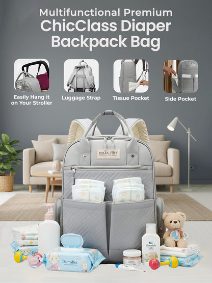 Multifunctional Premium ChicClass Diaper Backpack Bag with baby items on a living room floor.