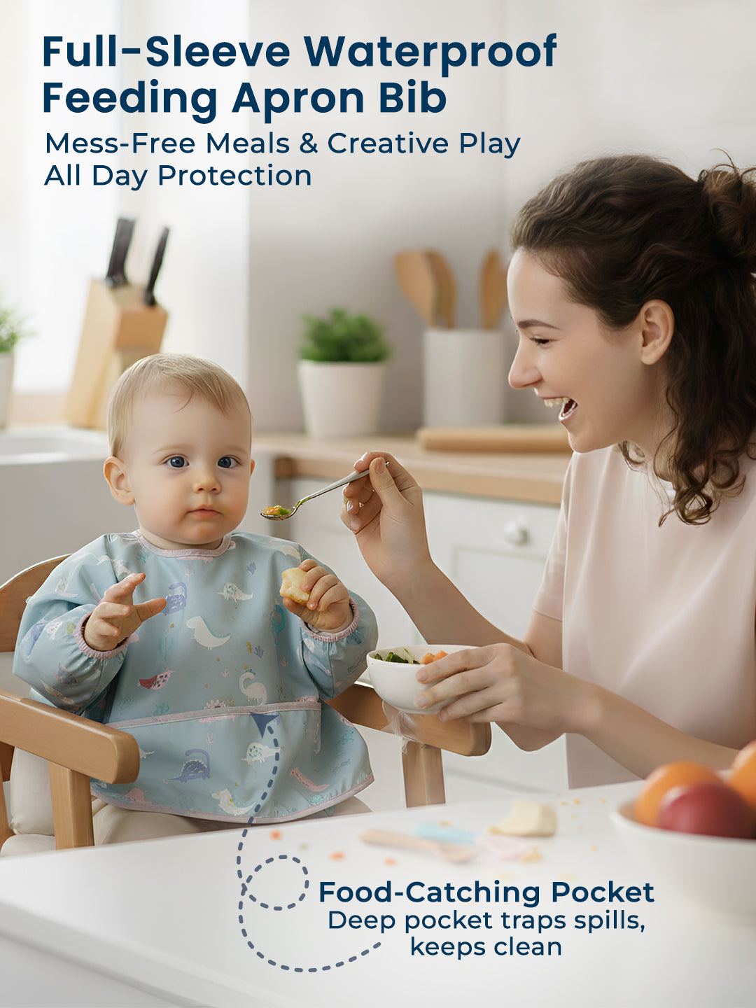 Woman feeding a baby in a full-sleeve waterproof feeding apron bib in a kitchen.