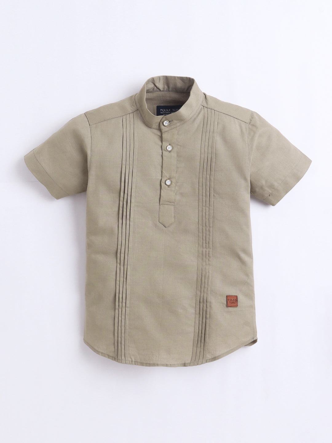 Beige short-sleeve shirt with button details on a white background