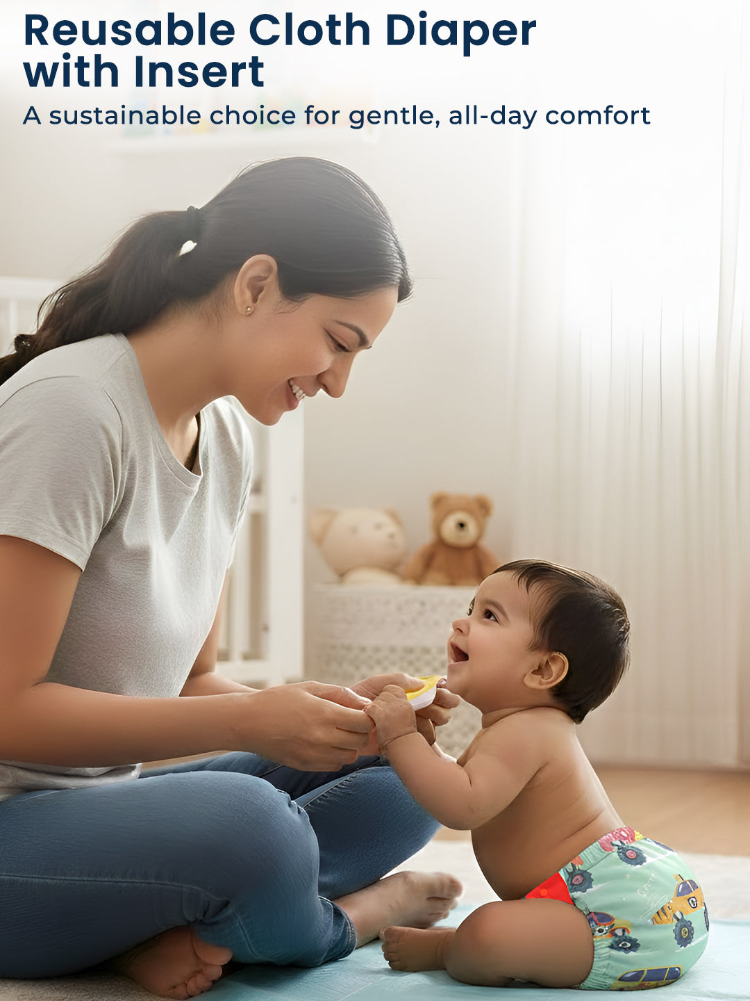 Woman feeding a baby wearing a reusable cloth diaper with insert in a home setting.