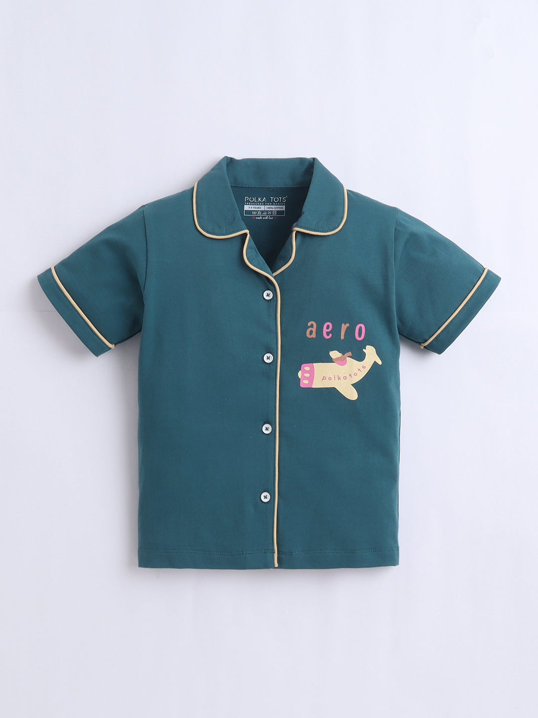 Green children's shirt with airplane design and 'aero' text on a light gray background