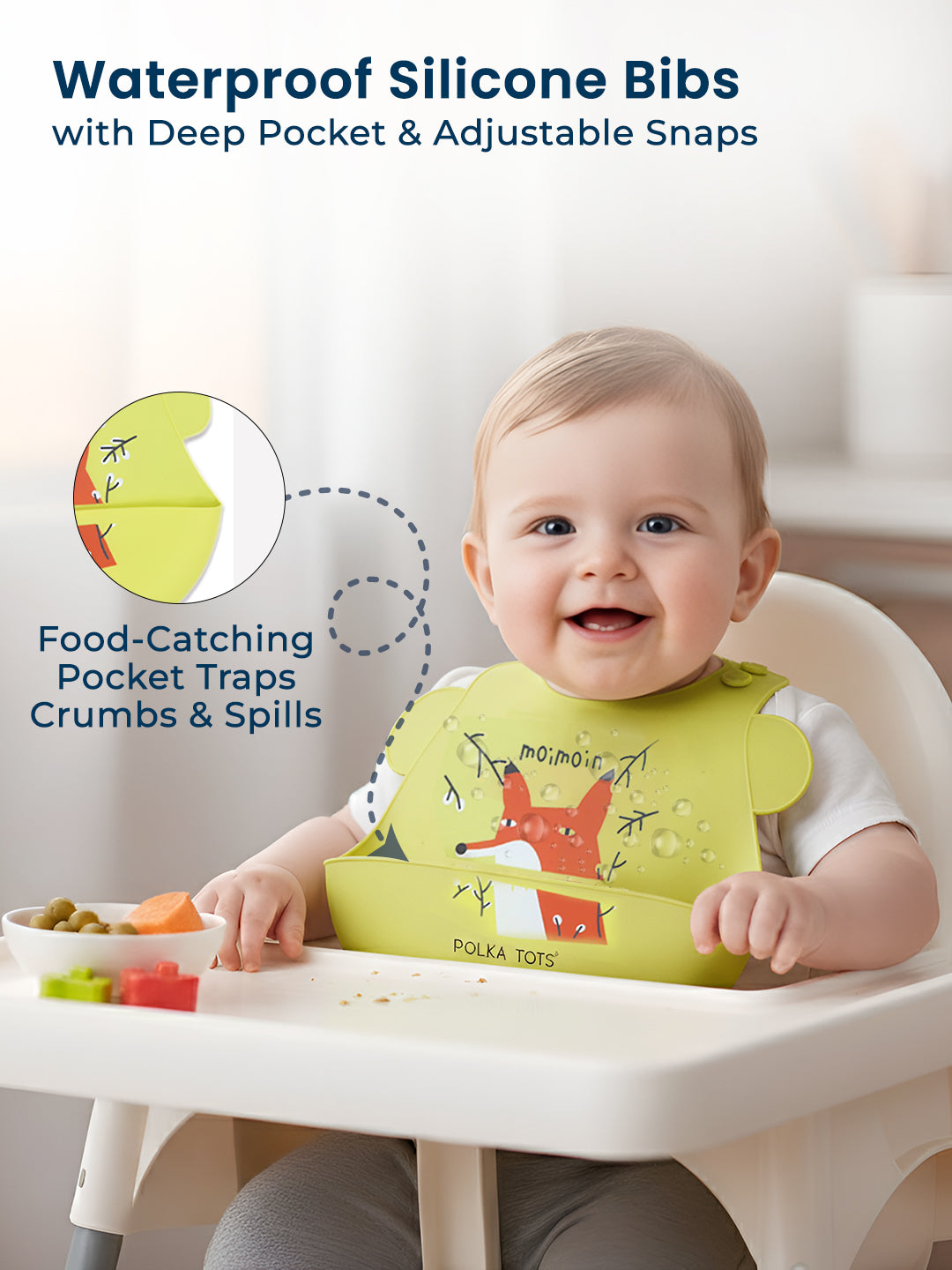 Baby wearing a green silicone bib with fox design, sitting in a high chair with food.