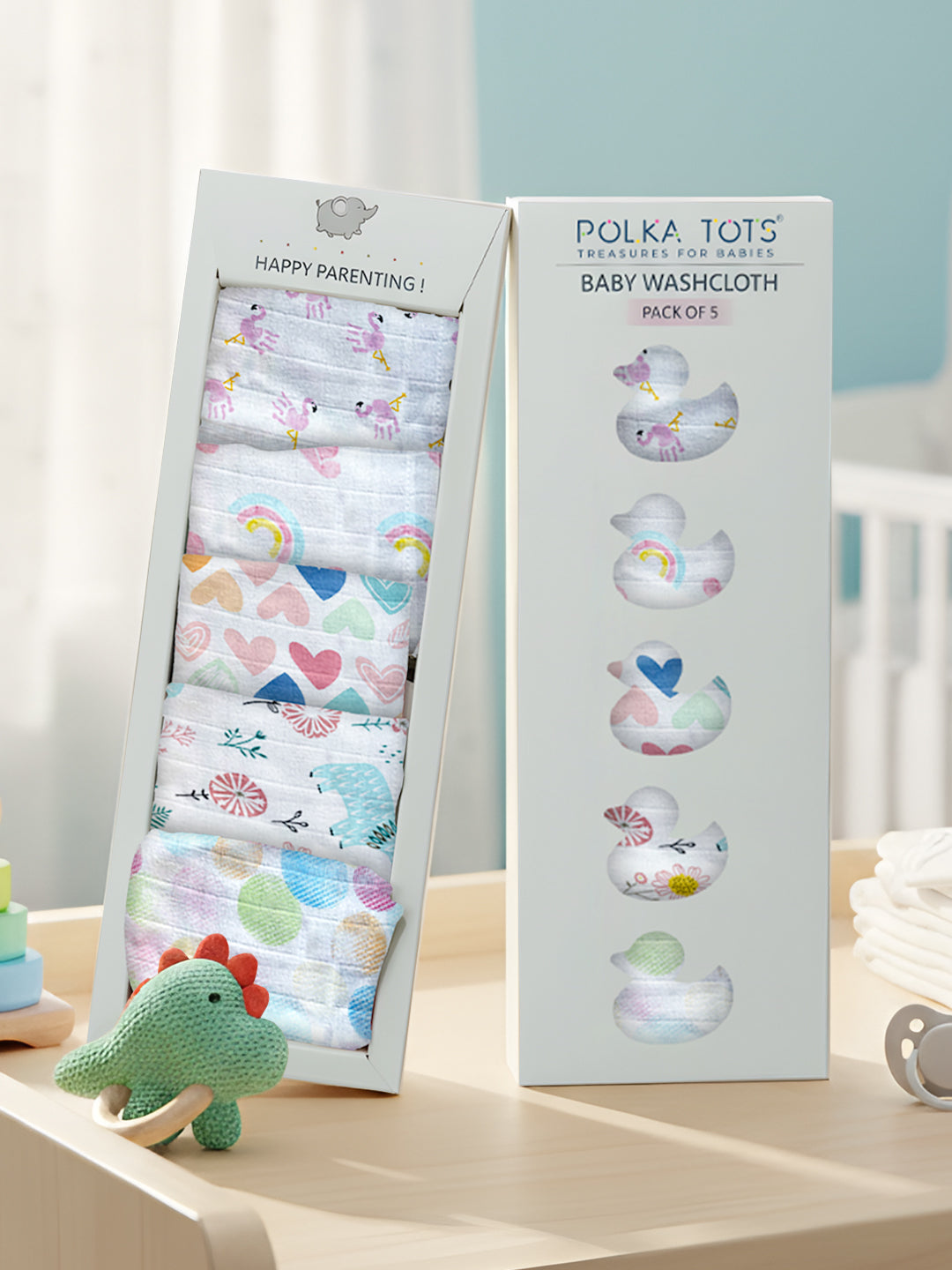 Polka Tots baby washcloth packaging with colorful designs on a neutral background