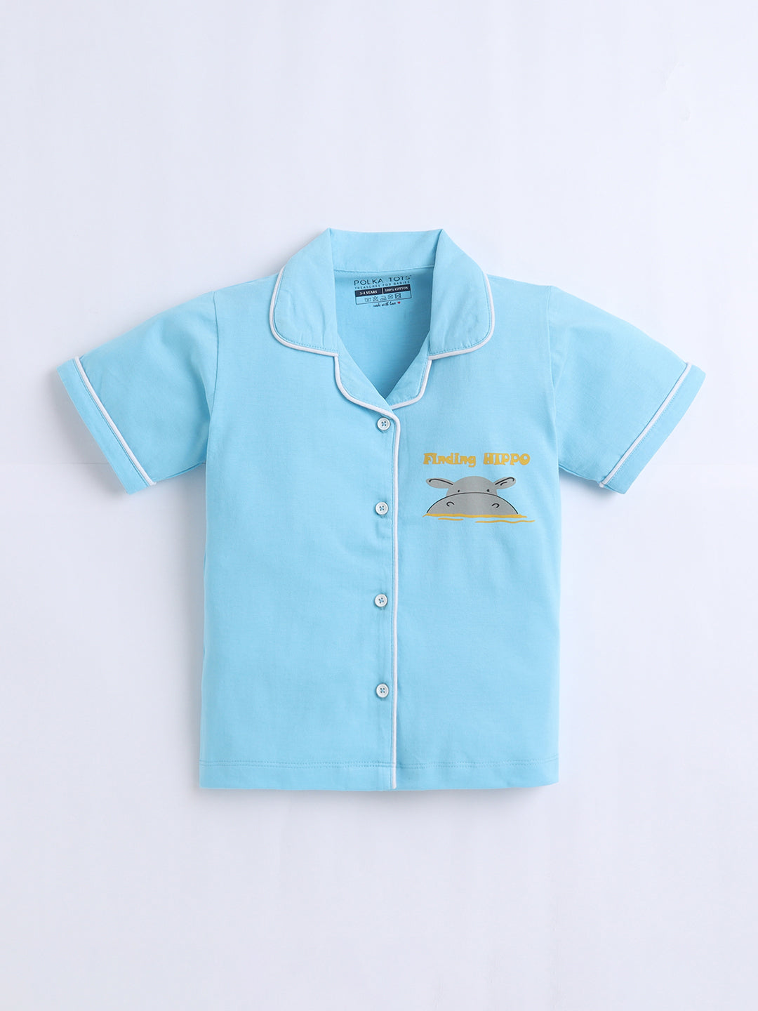 Light blue pajama top with white trim on a light gray background