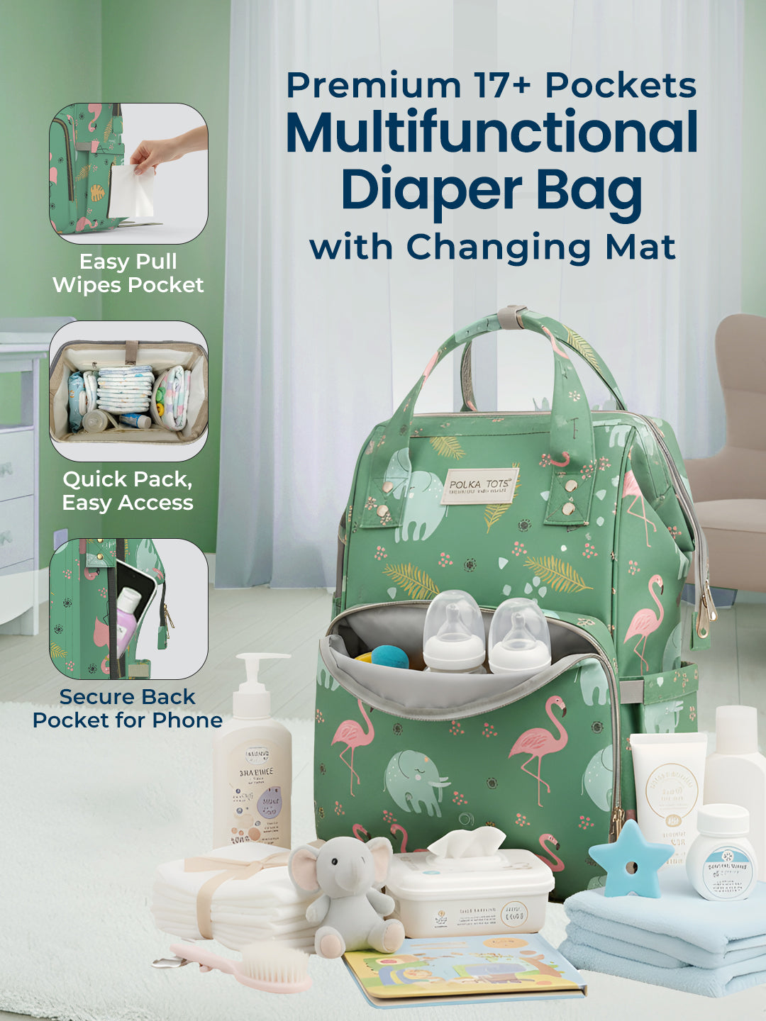 Green diaper bag with flamingo pattern on a white floor, surrounded by baby items.