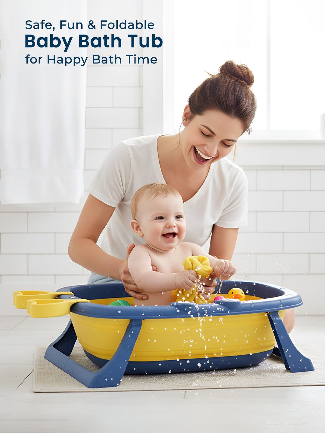 Woman and baby with a yellow and blue foldable baby bath tub in a bathroom setting.