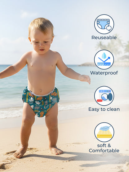 Child wearing a reusable waterproof diaper on a beach with features highlighted.