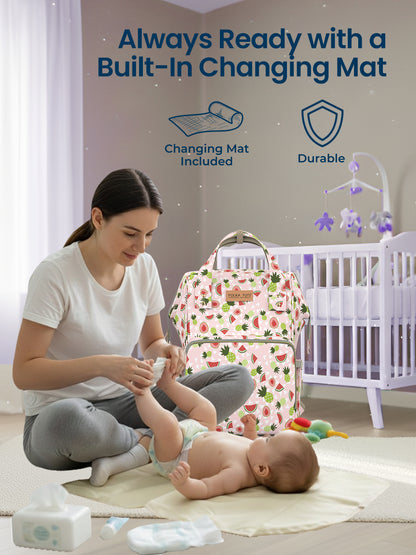 Woman changing a baby on a changing mat with a baby bag in the background
