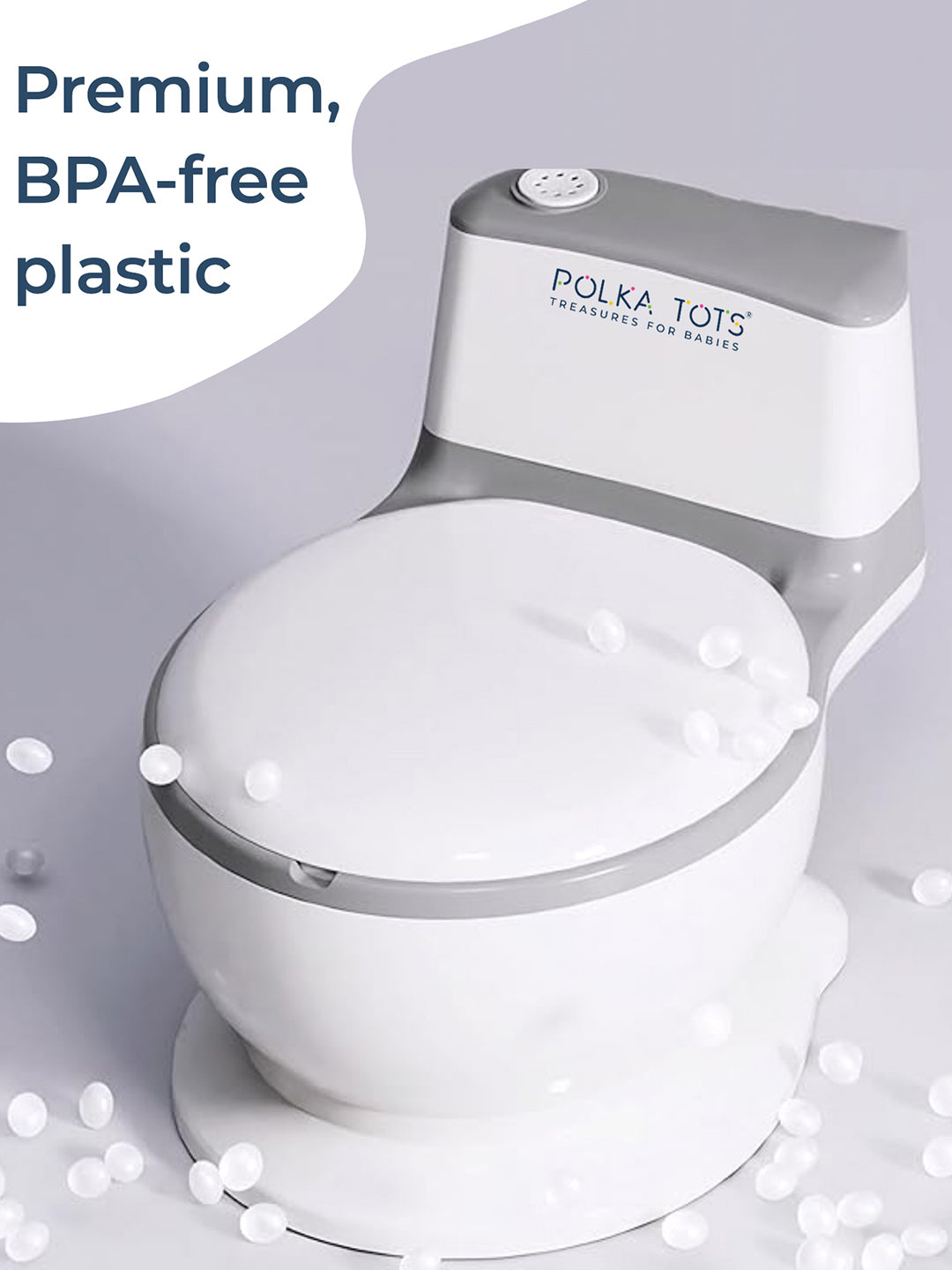 White baby seat with 'Polka Tots' branding on a light gray background