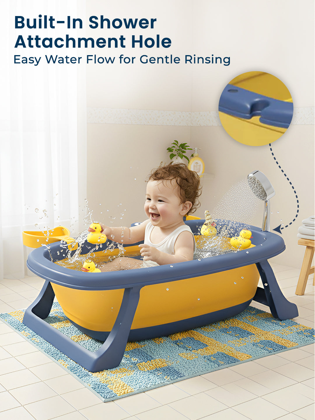 Child playing in a blue and yellow bathtub with a shower attachment, in a home setting.