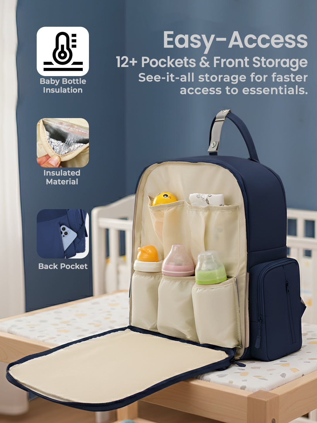 Navy blue and beige diaper bag with multiple pockets on a wooden surface.