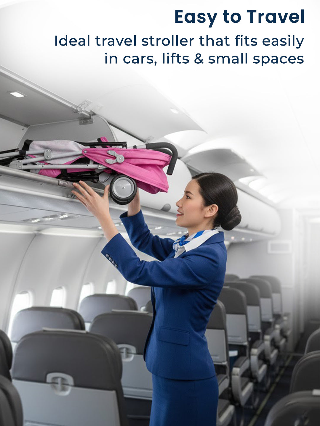 Woman in a blue uniform placing a pink travel stroller in an airplane overhead compartment.