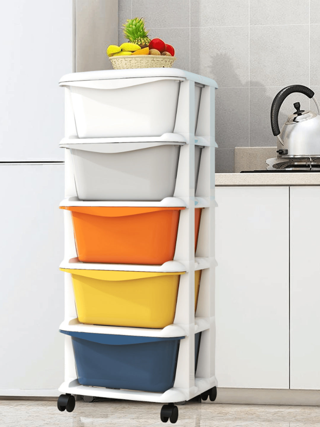 Colorful storage bins on a rolling cart in a kitchen setting