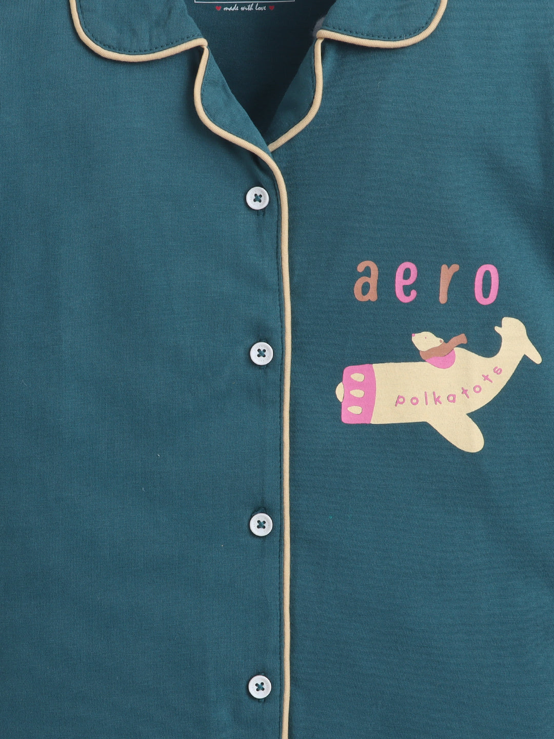 Teal pajama top with airplane design and 'aero' branding