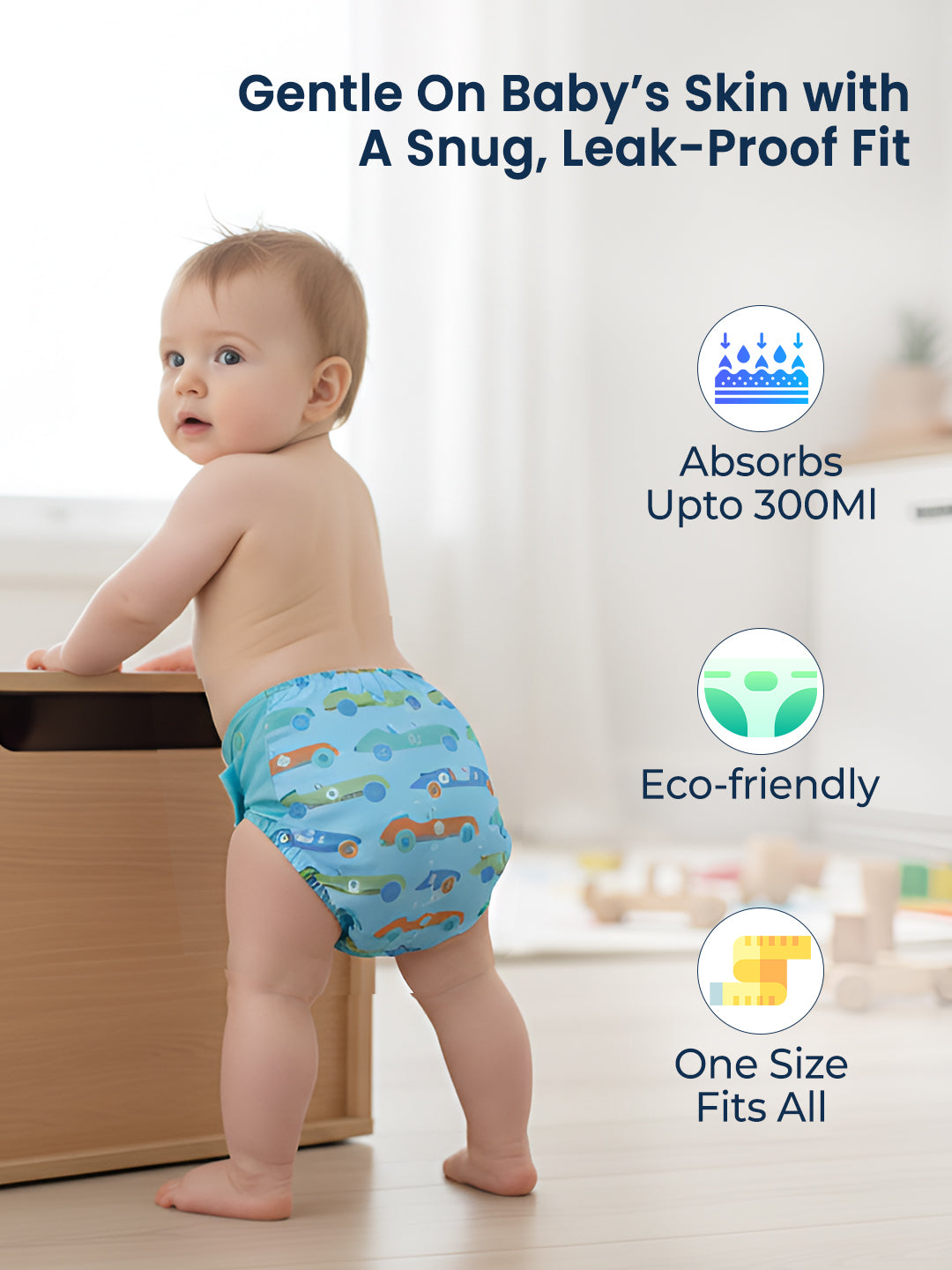 Baby wearing a blue diaper with car design, standing on a light wooden floor.