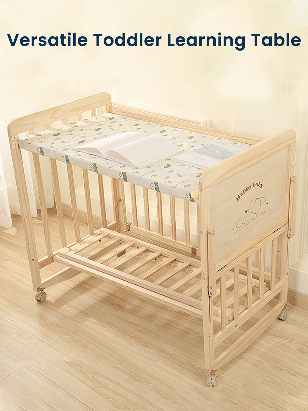 Wooden toddler learning table with a cushioned top on a light wooden floor.