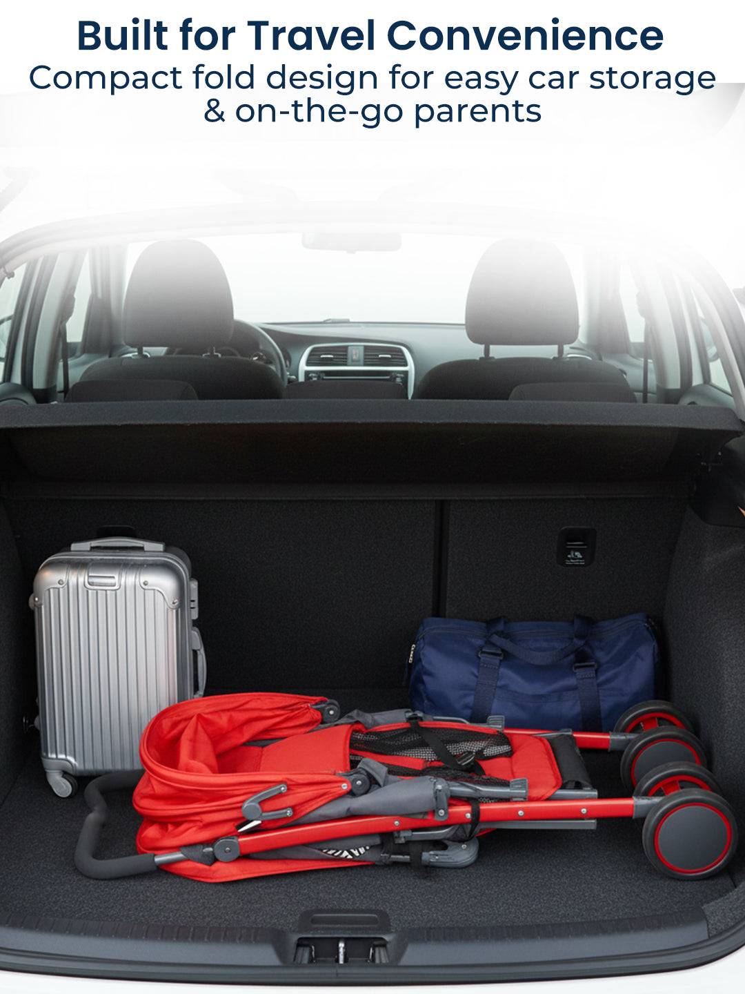 Car trunk with a folded red stroller, silver suitcase, and blue bag, labeled for travel convenience.