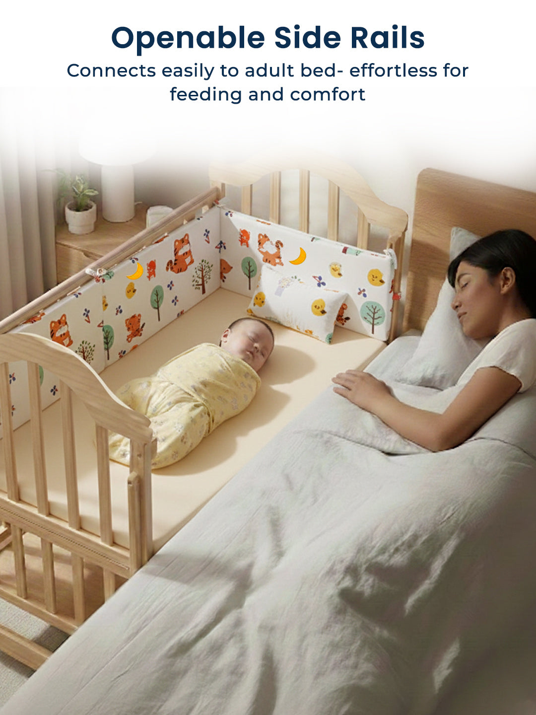Baby in crib with openable side rails next to a sleeping adult, with text highlighting ease of use.