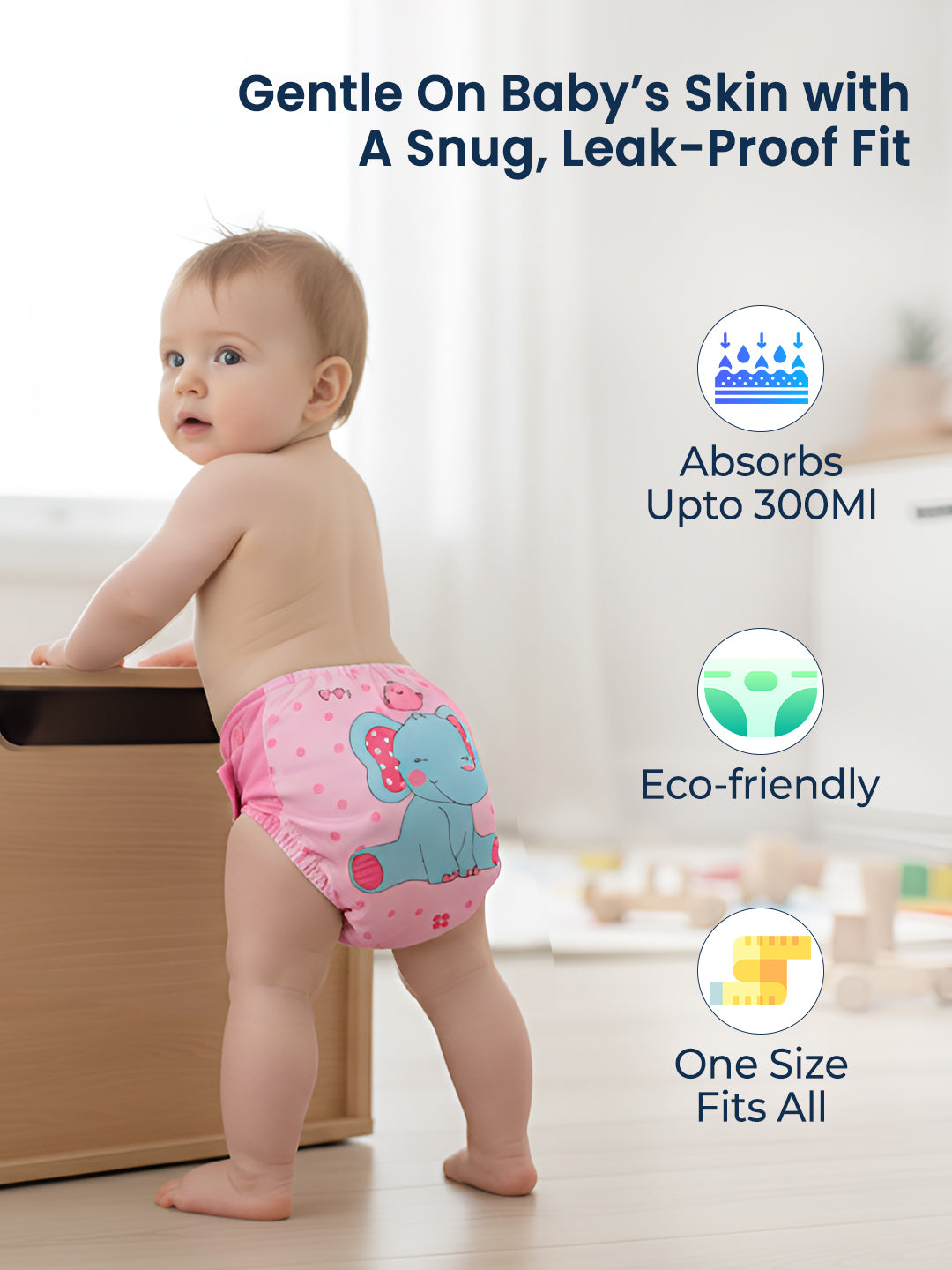 Baby wearing a pink diaper with an elephant design, standing in a room with toys.