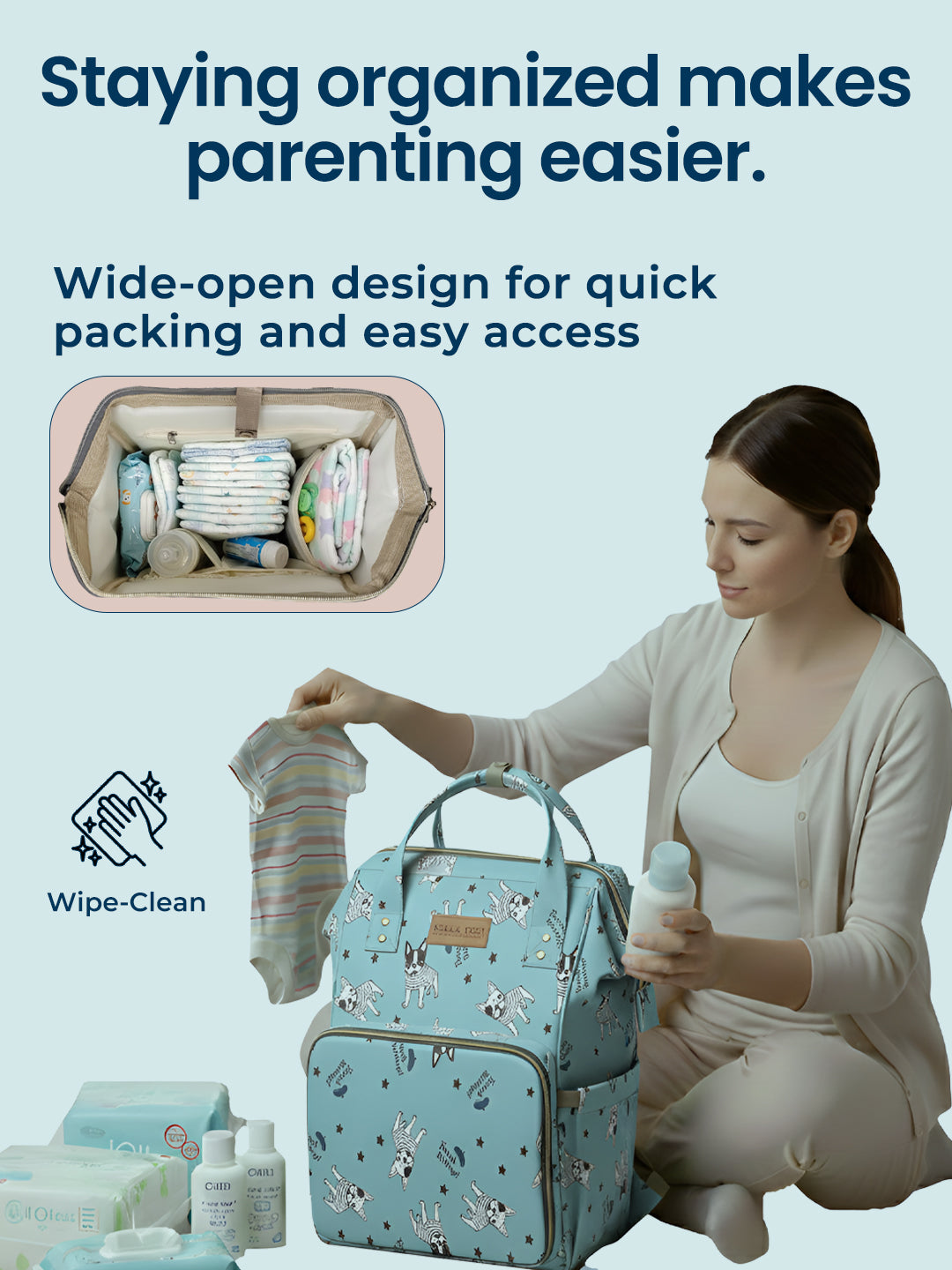 Woman organizing items into a patterned diaper bag with text about organization benefits.