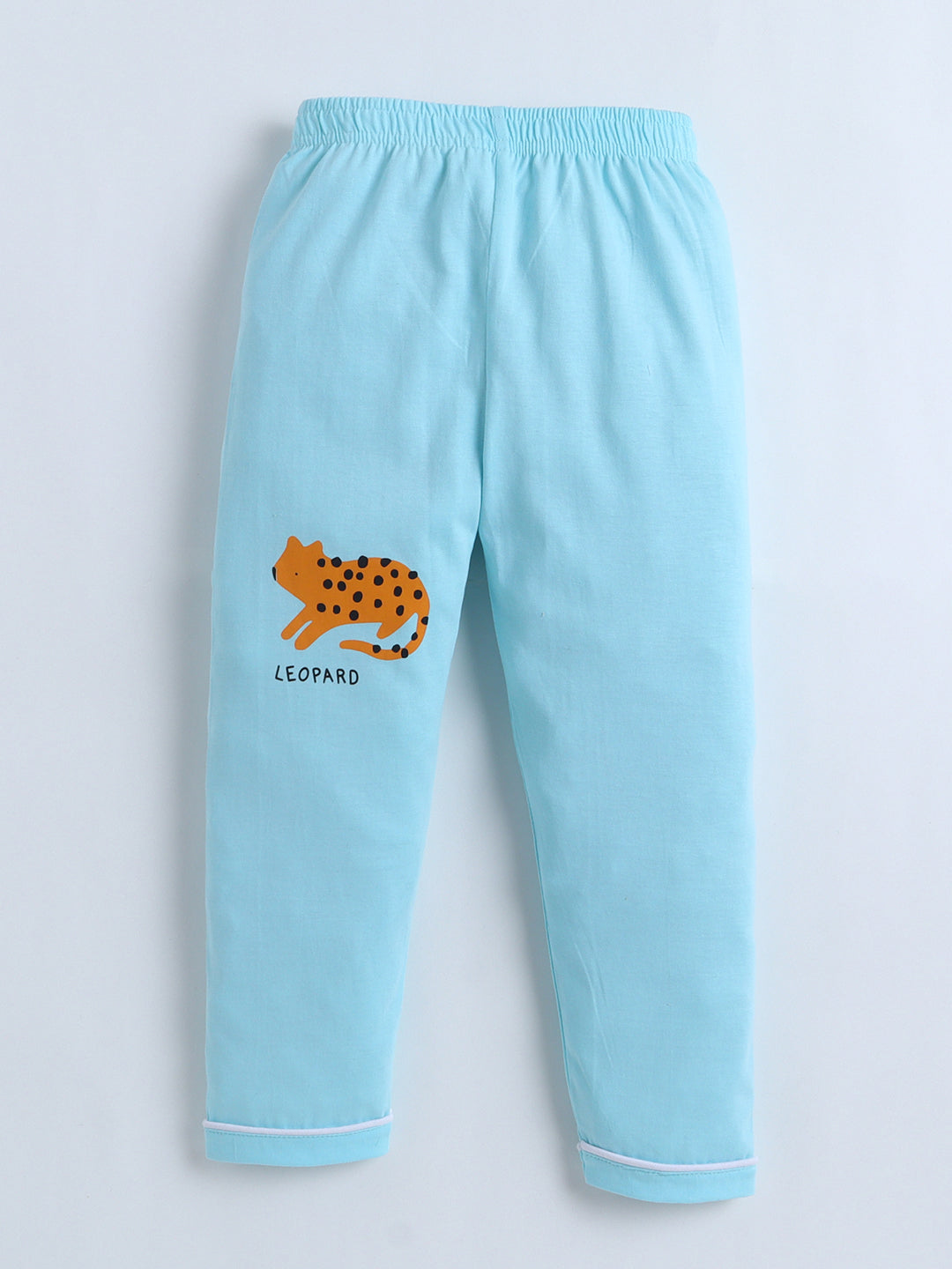 Light blue pajama pants with a leopard design on a light gray background