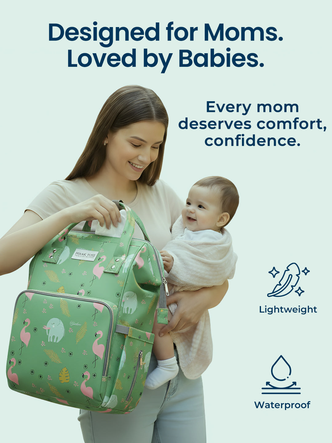 Woman holding a green diaper bag with a baby, with text about the product's features.