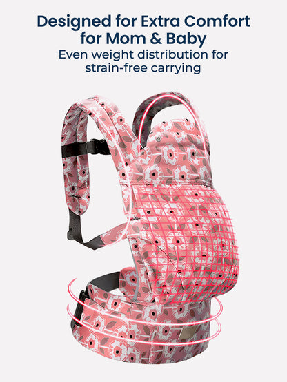 Pink baby carrier with floral pattern on a white background, highlighting comfort features for mom and baby.