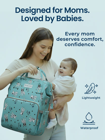 Woman holding a baby and a teal diaper bag with text about comfort and confidence for moms.
