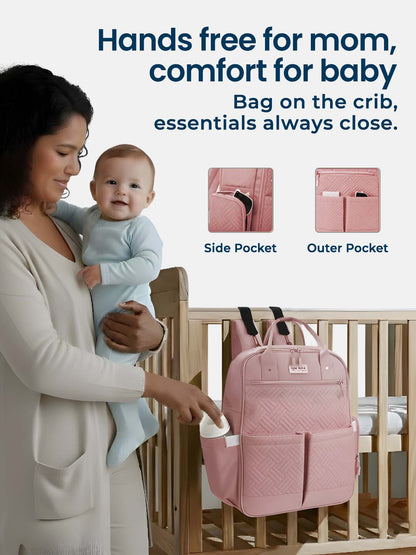 Woman holding a baby next to a pink backpack with pockets, text about hands-free mom and comfort for baby.