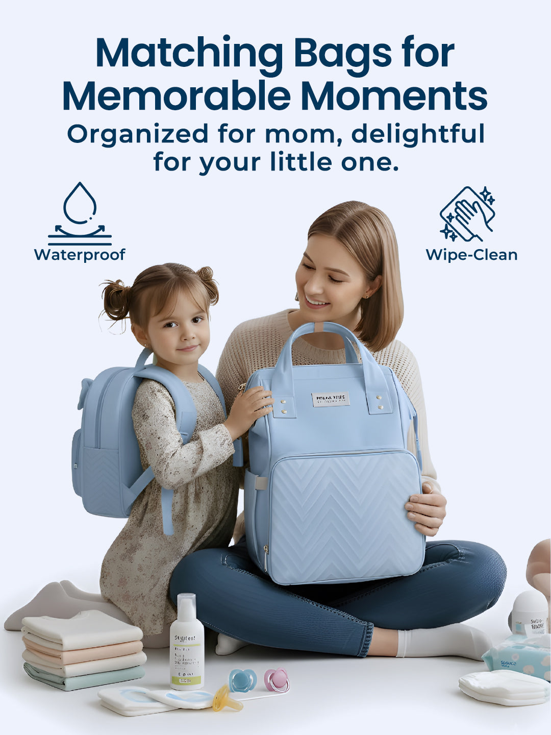 Woman and child holding matching blue bags with text about features on a light blue background