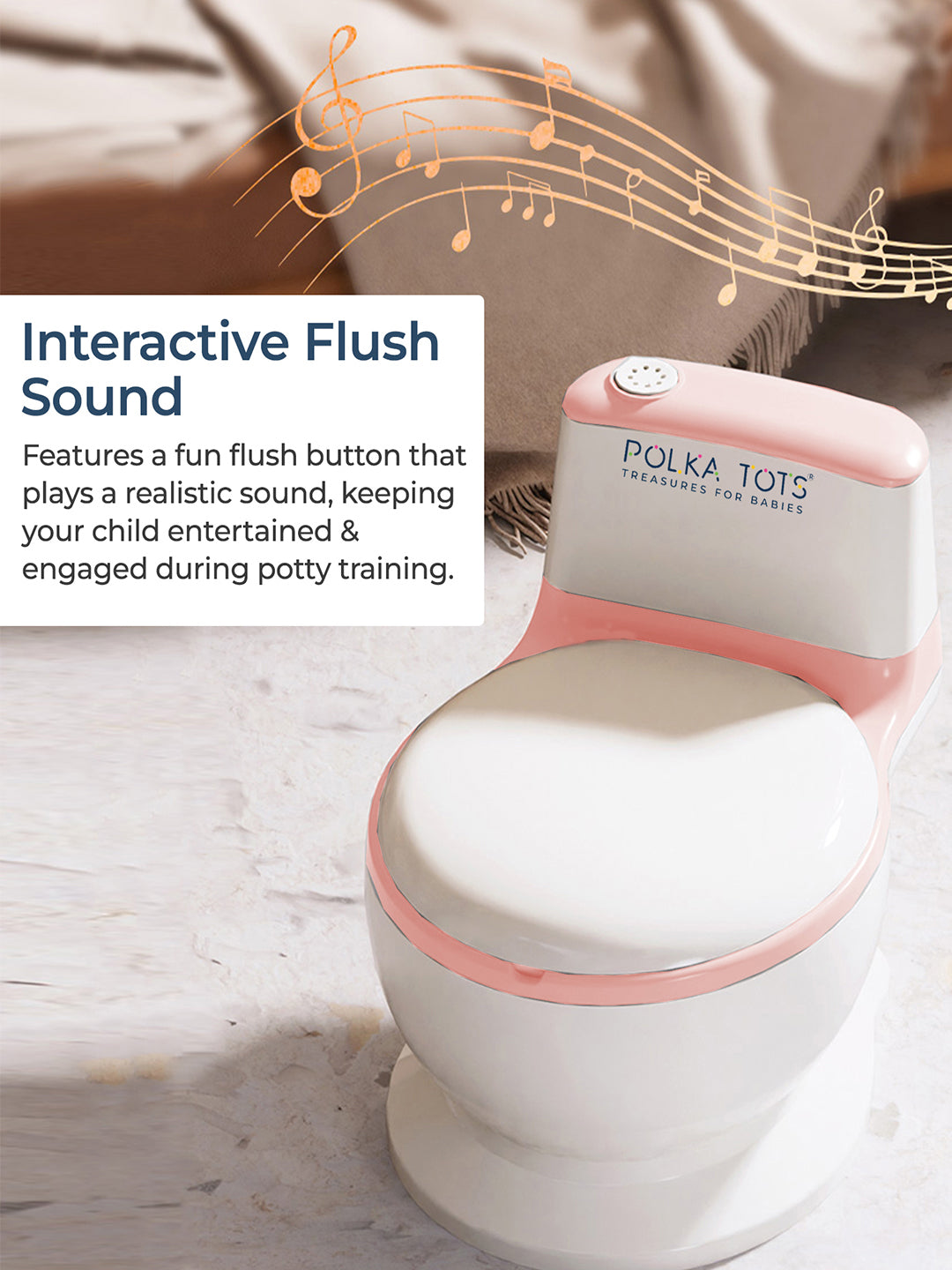 Potty training seat with interactive flush sound feature by Polka Tots on a neutral background.