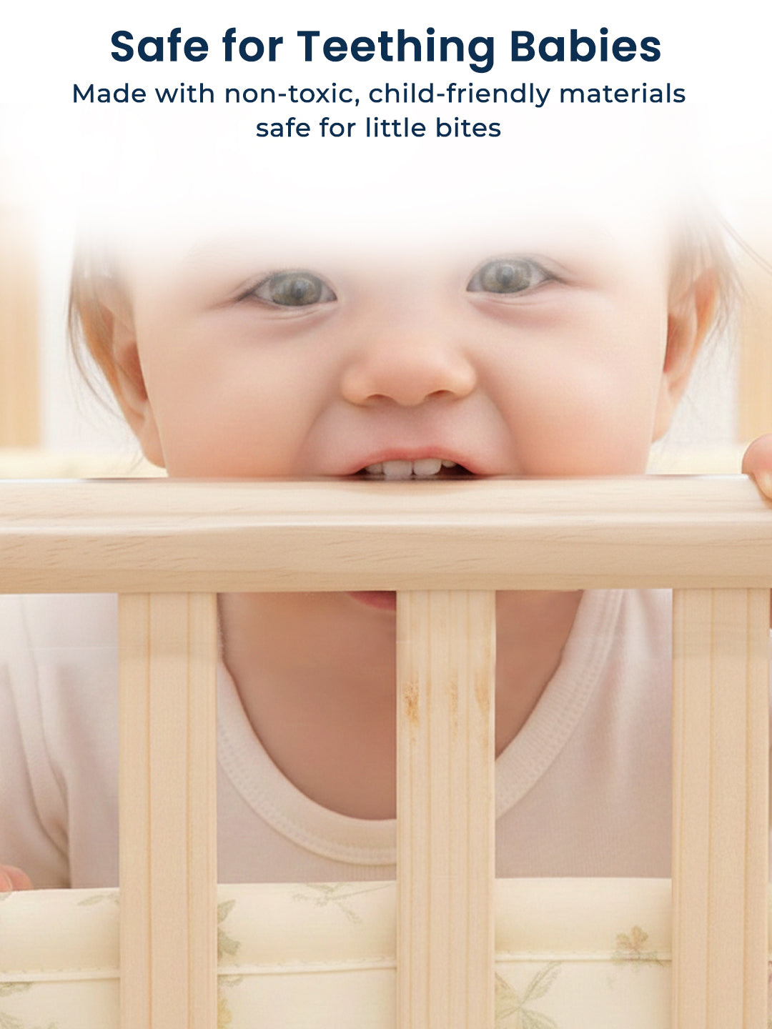Baby playing with a wooden crib bar, promoting safety for teething babies.