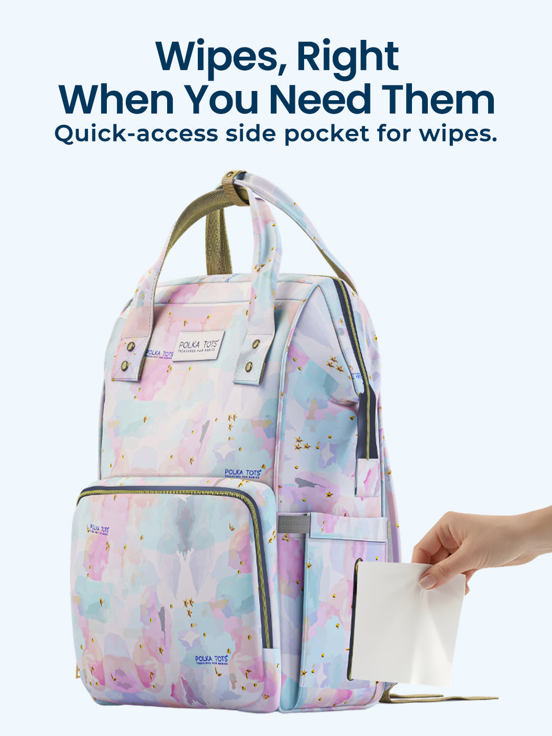 Multicolored backpack with a quick-access side pocket for wipes, featuring text 'Wipes, Right When You Need Them'.