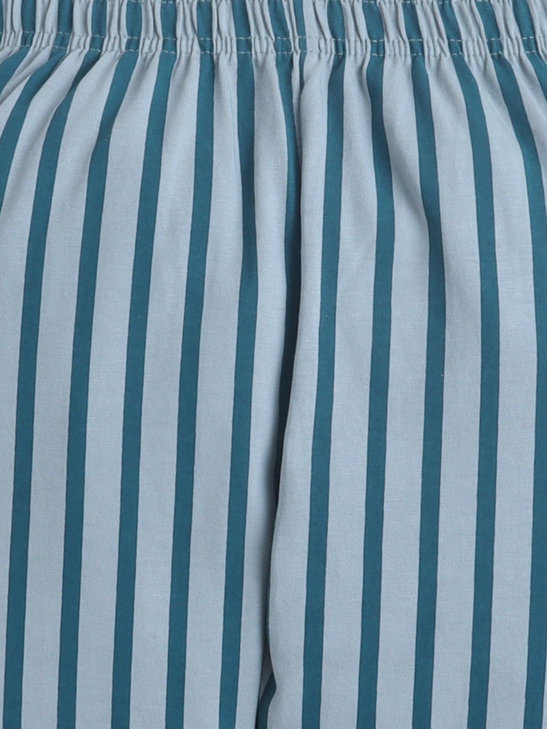 Close-up of blue and white striped pants with a focus on the fabric texture.