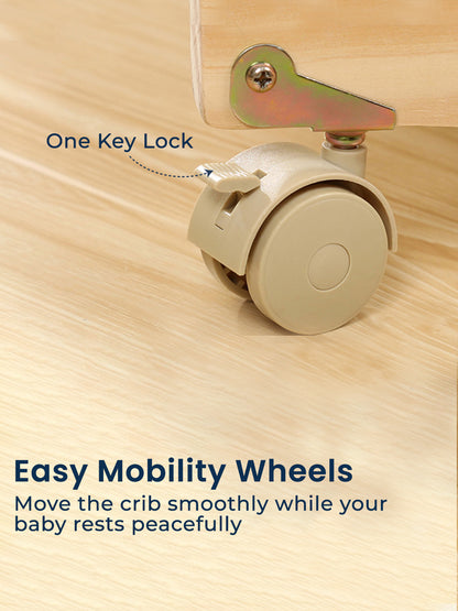 Crib wheel with one key lock mechanism on a wooden surface