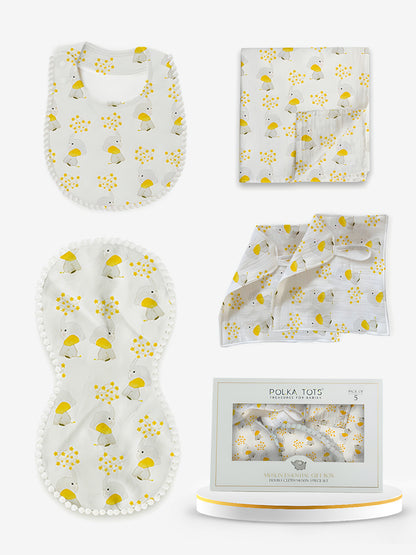 Baby product set with bib, burp cloth, and booties featuring yellow floral pattern on a white background.