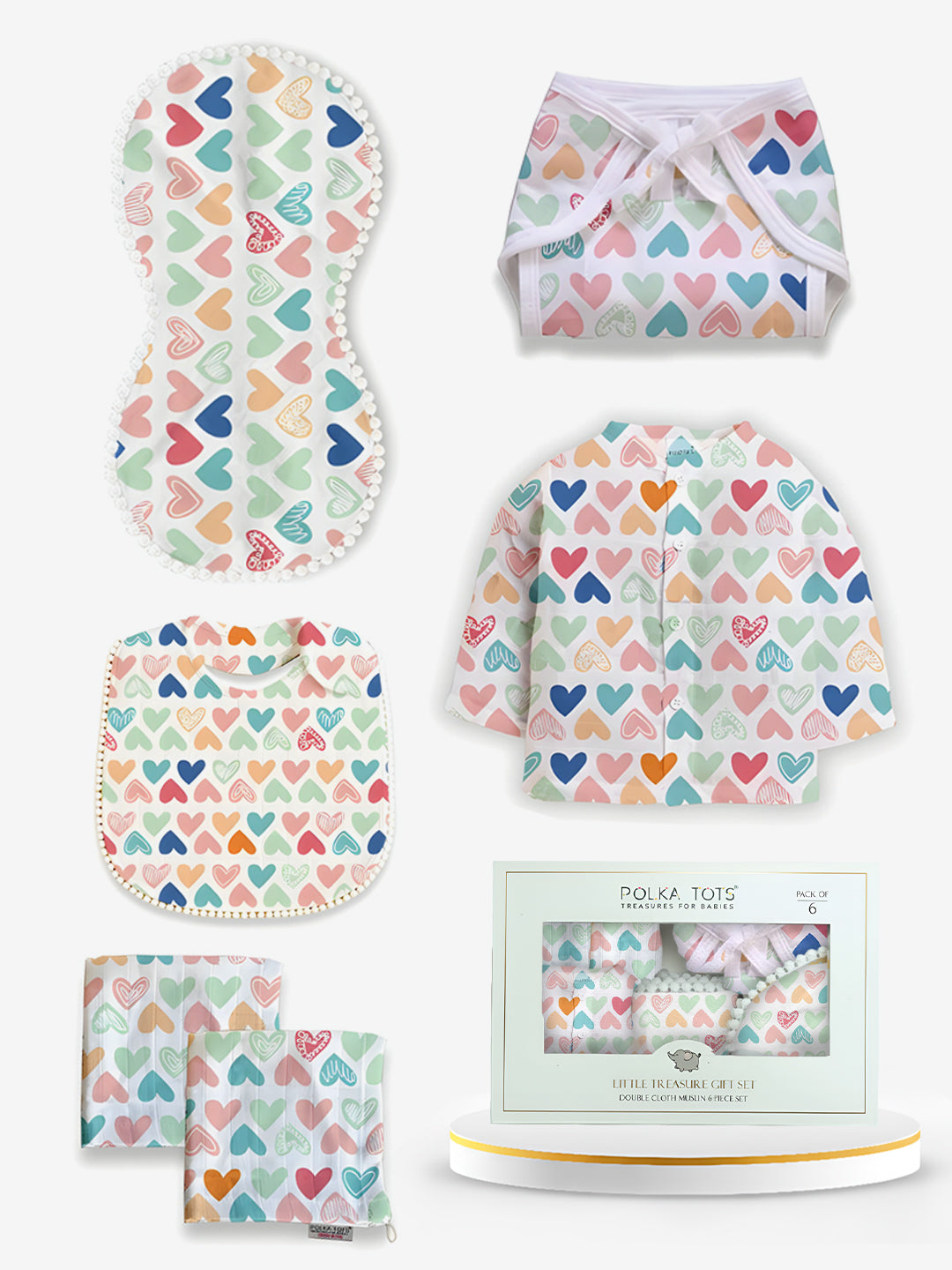 Baby clothing set with heart patterns on a white background