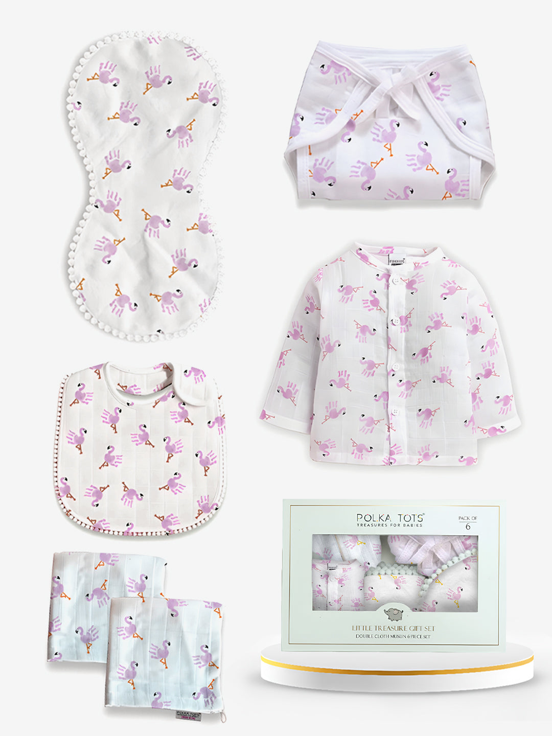 Baby clothing set with floral patterns in a gift box on a white background