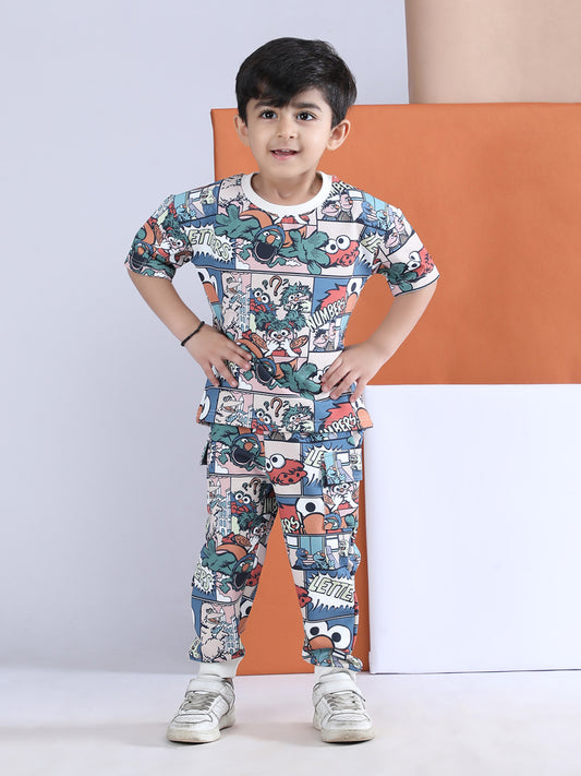 Child wearing a colorful outfit with a pattern of cartoon characters against a white background.